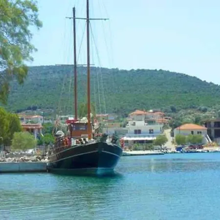 White In Olive Trees And Seaview To Panagia Almiropótamos