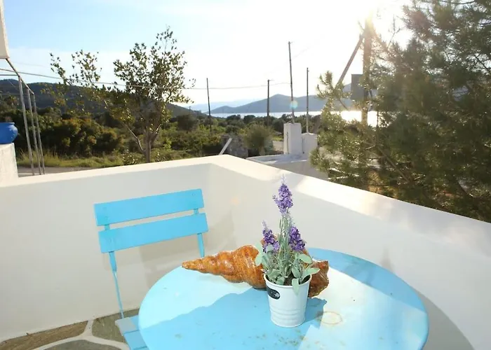 White In Olive Trees And Seaview To Panagia